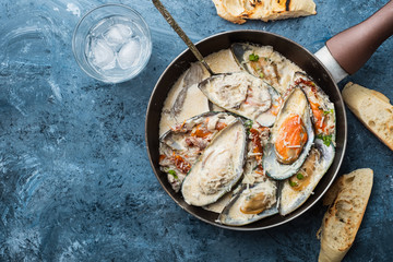 Mussels with Blue Cheese Sauce and Garlic Baguette.