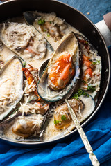 Mussels with Blue Cheese Sauce and Garlic Baguette.