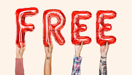 Red alphabet balloons forming the word free