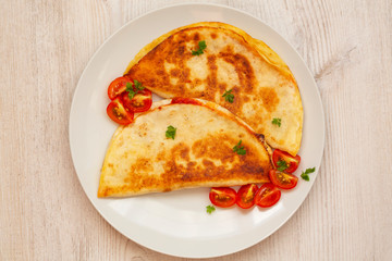 Mexican quesadilla with chicken, cheese and tomatoes