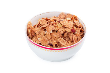 Corn flakes in a bowl isolated on white background