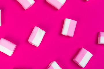 marshmallows on a pink background. top view