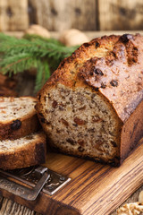 Baked Christmas loaf cake on wooden board