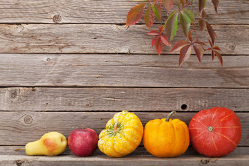 Autumn still life with pumpkins and fruits