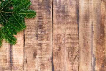 Christmas greeting card wooden background.