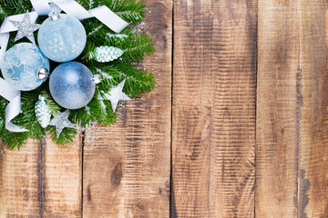 Christmas greeting card wooden background.