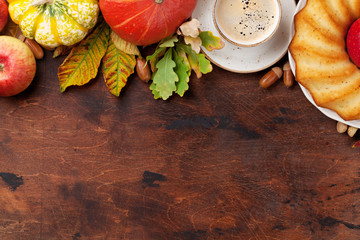 Autumn backdrop with pumpkins and fruits