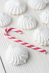 French vanilla meringue cookies close up white christmass background.