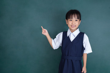 Asian Chinese little girl pointing with finger