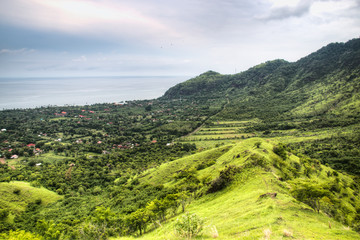 Fototapeta na wymiar Landscape with green hills in Pemuteran in Bali, Indonesia 