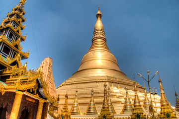 Fototapeta premium The impressive golden Shwedagon Pagoda is one of the most famous temples in Yangon, the capital of Myanmar 