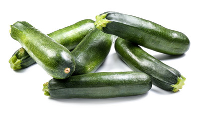 Fresh zucchinis on white background