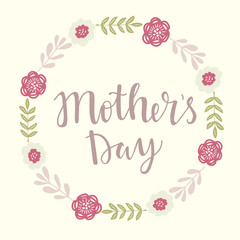 Happy Mothers day vector lettering illustration greeting card. Hand drawn lettering text on  decorated with simple colorful flower wreath background