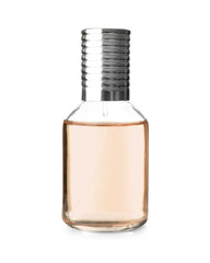 Transparent bottle of perfume on white background