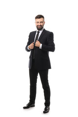 Confident businessman on white background