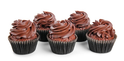 Delicious chocolate cupcakes on white background