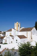 Fototapeta premium Elevated view of Santiago church in the old town (Igreja de Santiago), Tavira, Algarve, Portugal.
