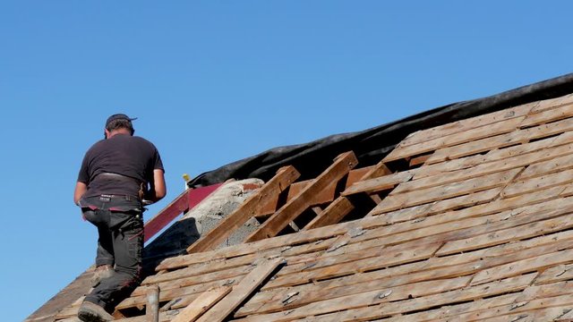 carpenter working on the roof