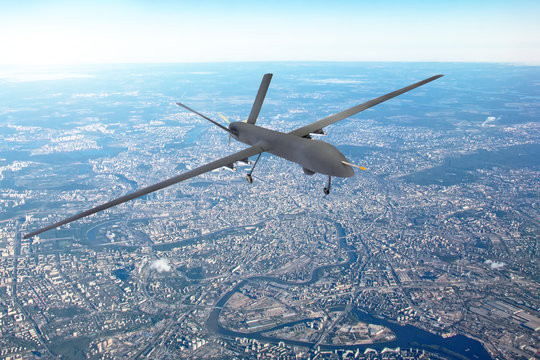 Unmanned Military Drone Patrols The Territory, Flying Over The Disrtict Of City.