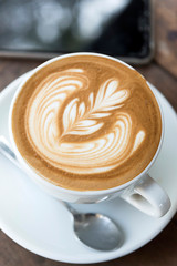 A cup of coffee with love latte art