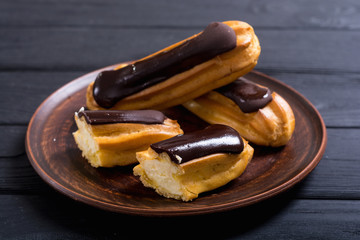 French dessert eclair with chocolate .