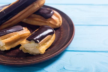Foto op Plexiglas French dessert eclair with chocolate . © whitestorm