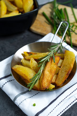Fried potatoes with rosemary. 