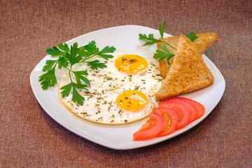 breakfast on plate, fried eggs with vegetables