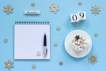 calendar December 9 cup cocoa and marshmallow, empty open notepad