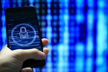 protected in stream of data flow. padlock icon symbolise security and motion movement of binary code computer data moving in the background. light of blue colour in dark background.