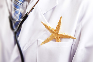 Starfish in doctors breast pocket