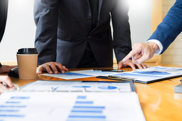 Team work process. young business managers crew working with startup project. laptop in office analyze profit graph plan