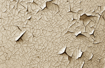 Crack and damage on painted texture in brown tone.