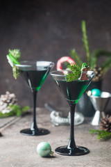 Green cocktails in martini glasses