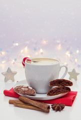 Christmas chocolate Cookies with garland and coffee cup.