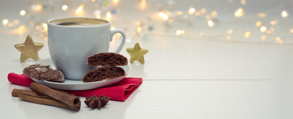 Christmas chocolate Cookies with garland and coffee cup.