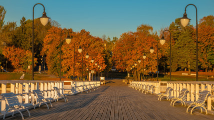 The pier in the city of Gdynia in autumn scenery. Beautiful sunrise.