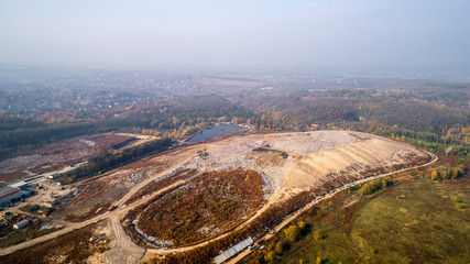 Aerial view of the big city dump. Smog formed in the sky