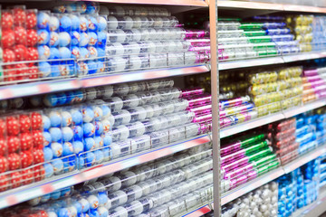 Decoration items for Thanksgiving and Christmas seasons in different designs and colors are displayed