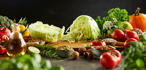 Cabbage sliced in half sitting on cutting board