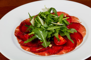 Beef carpaccio with salad