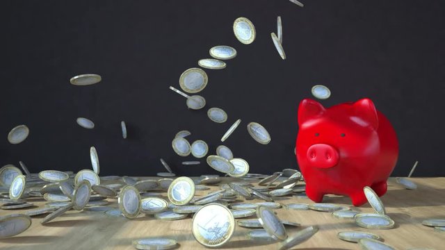 Eine Animation fallenden 1 Eurom&uuml;nzen auf einem Holztisch mit rotem Sparschwein