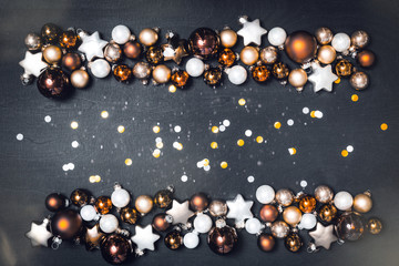 Flatlay of christmas concept with baubles and blank space with black background