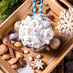 Fototapeta na wymiar hot chocolate with colorful mini-marshmallows mix
