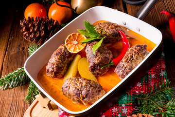 Wintry beef roulades with plum and bacon stuffing and cucumber