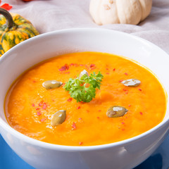 healthy pumpkin soup with ginger carrots and coconut milk