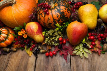 Thanksgiving arrangement with pumpkin and pear