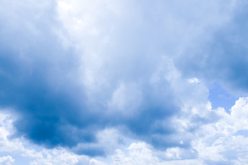 White clouds in the blue sky.