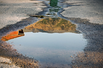 Image reflected in a puddle - 229361407