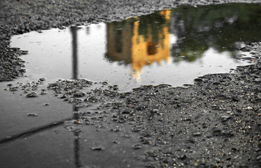 Image reflected in a puddle